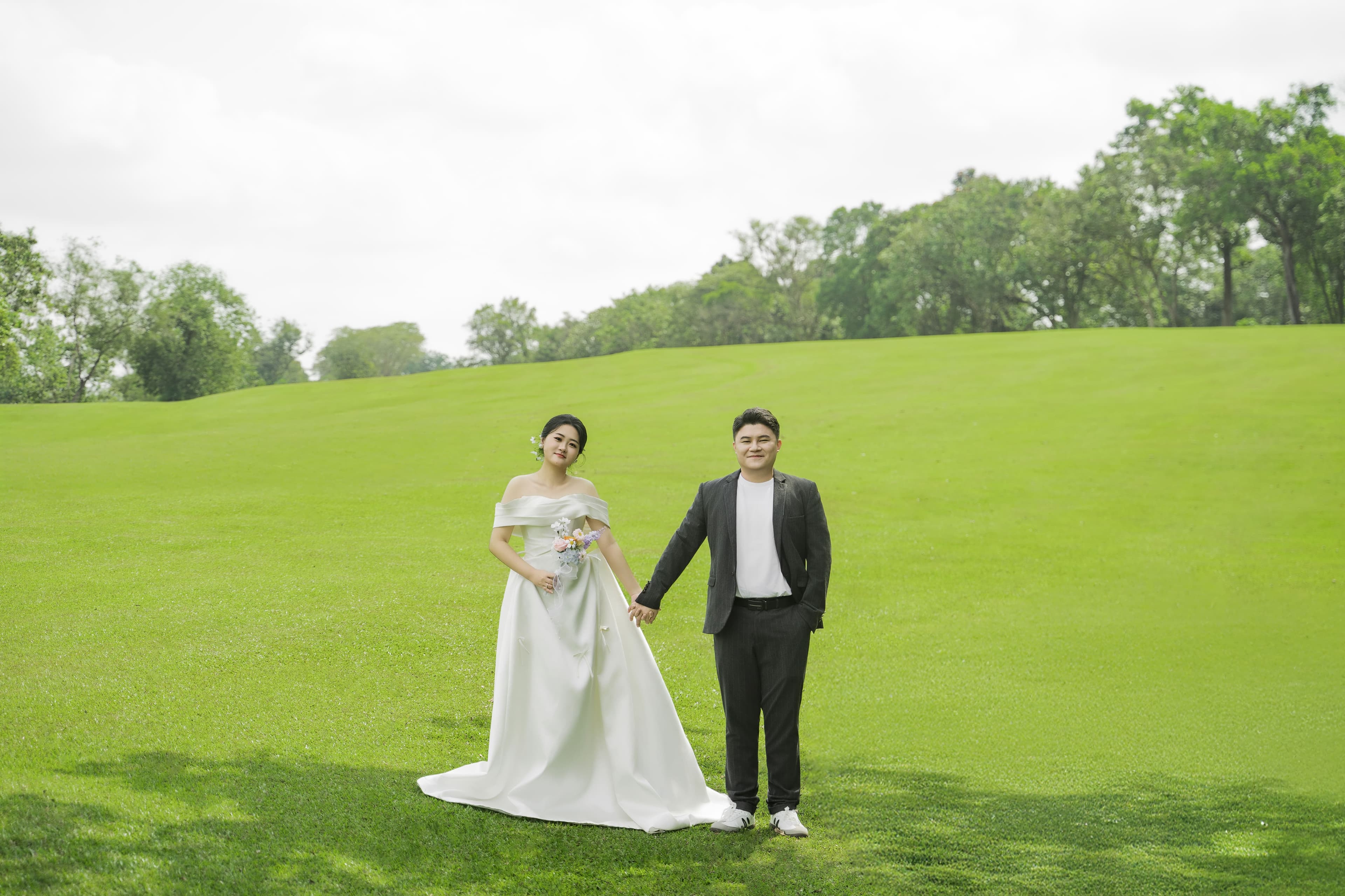 Alan and Claudia in a green field